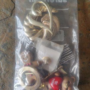 Mystery Bag of Nine Wearable Gold Tone Brooches And Pins